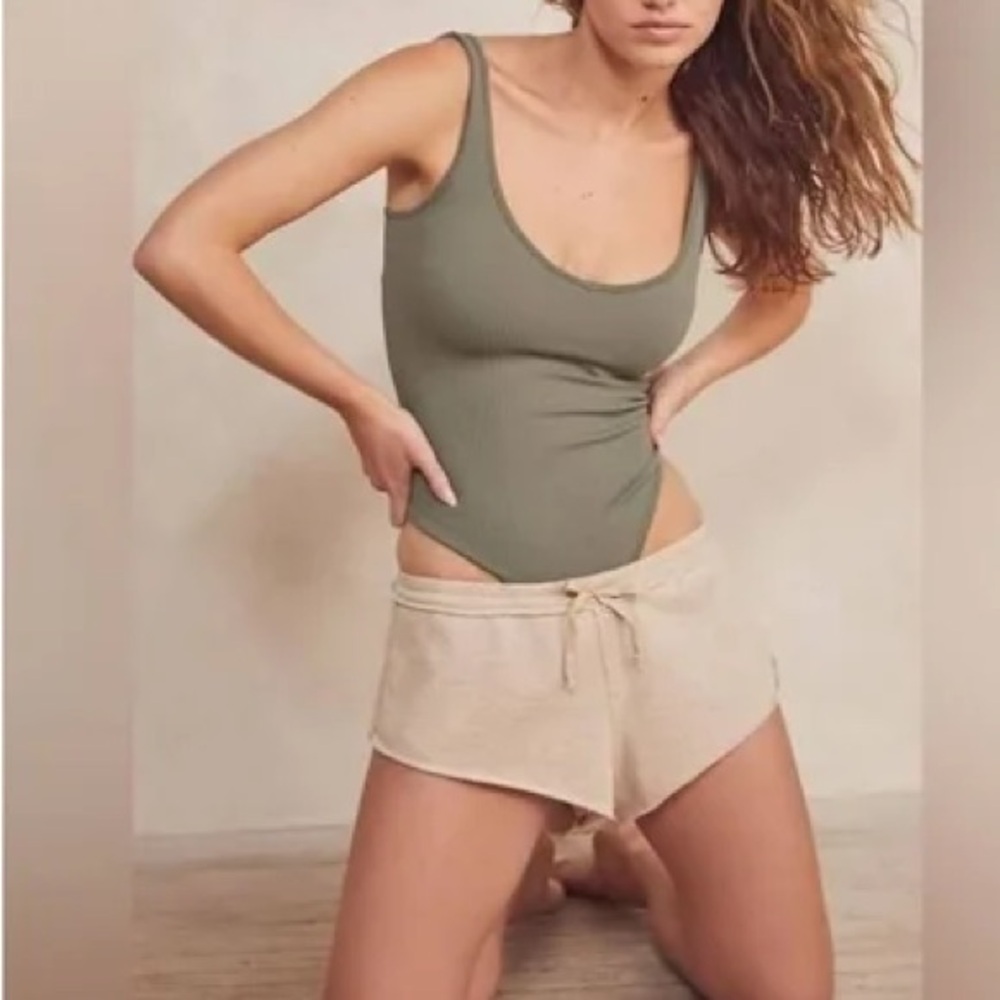 Free People XYZ ribbed Bodysuit in army. New with tags.